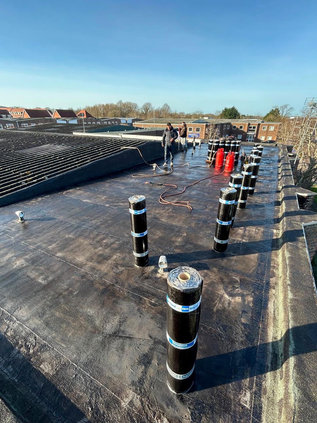 Commercial flat roof with ventilation outlets
