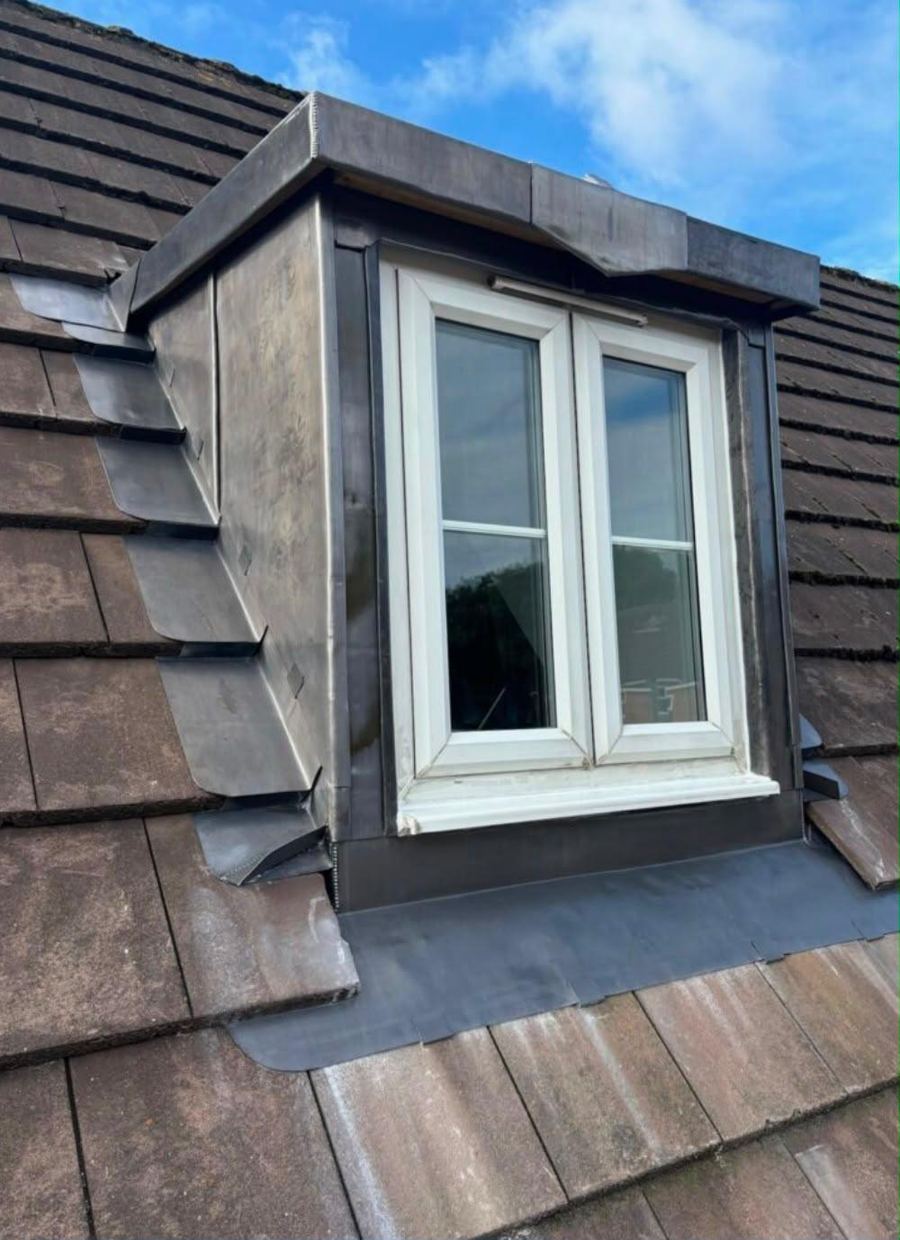 A dormer window clad in lead