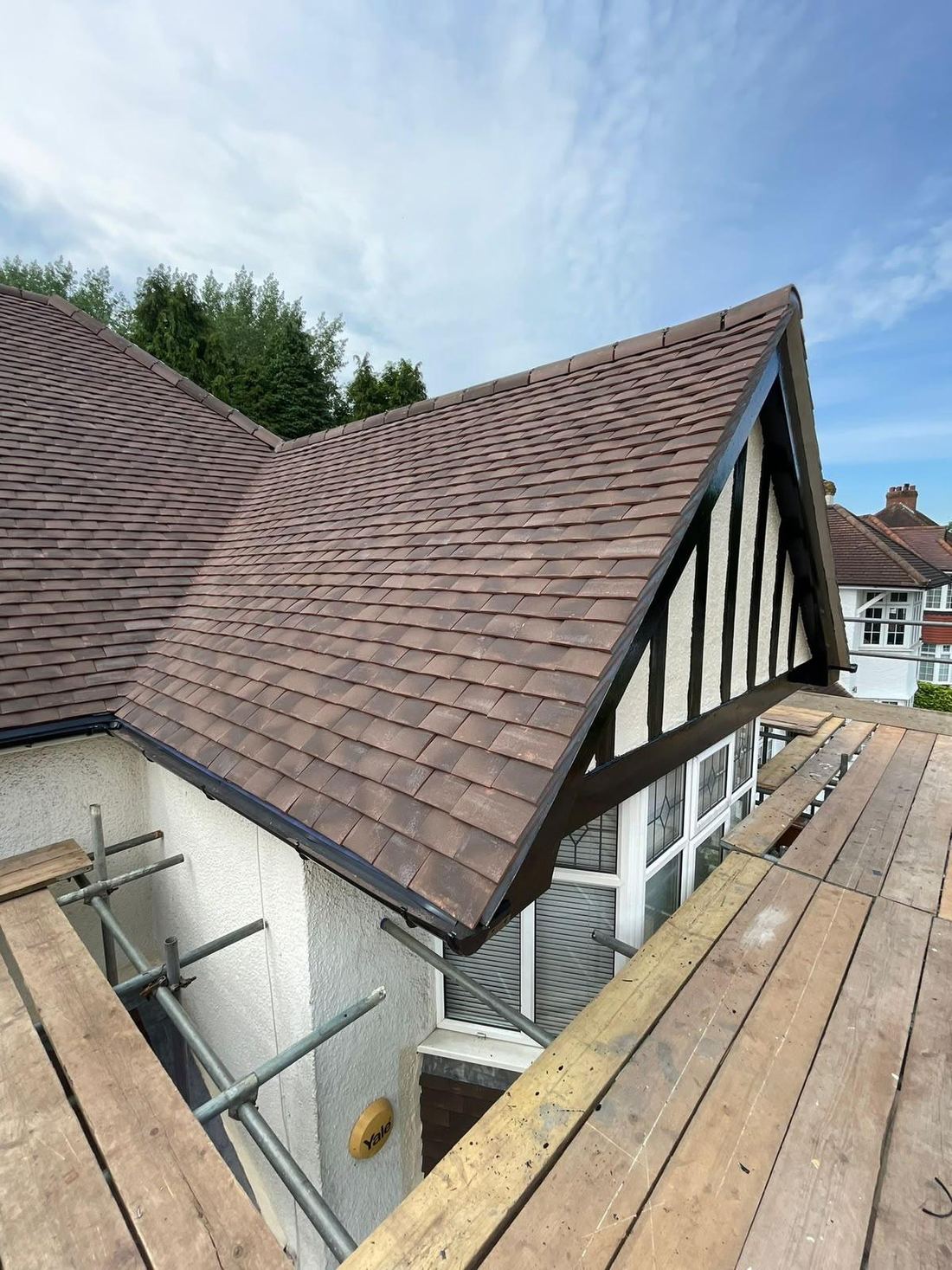 A newly tiled roof and gable end